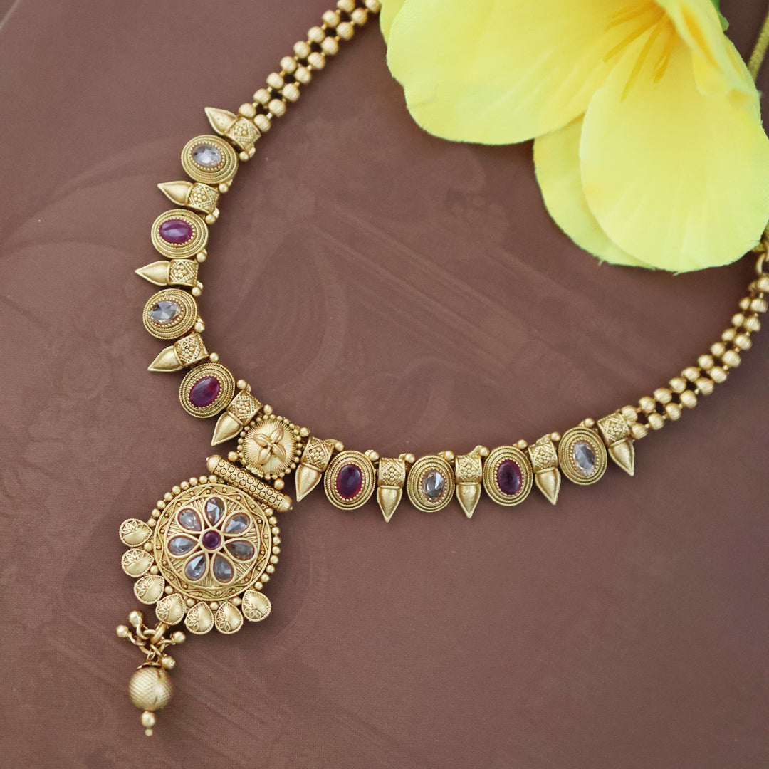Manvi gold plated stone necklace
