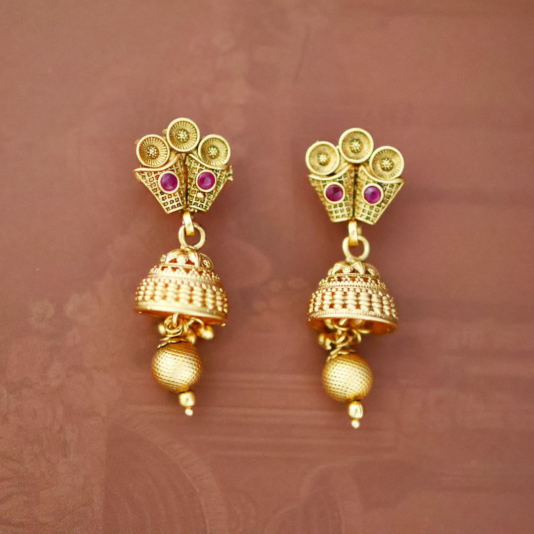 Manvi Gold tone ruby necklace set