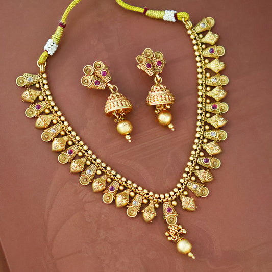 Manvi Gold tone ruby necklace set