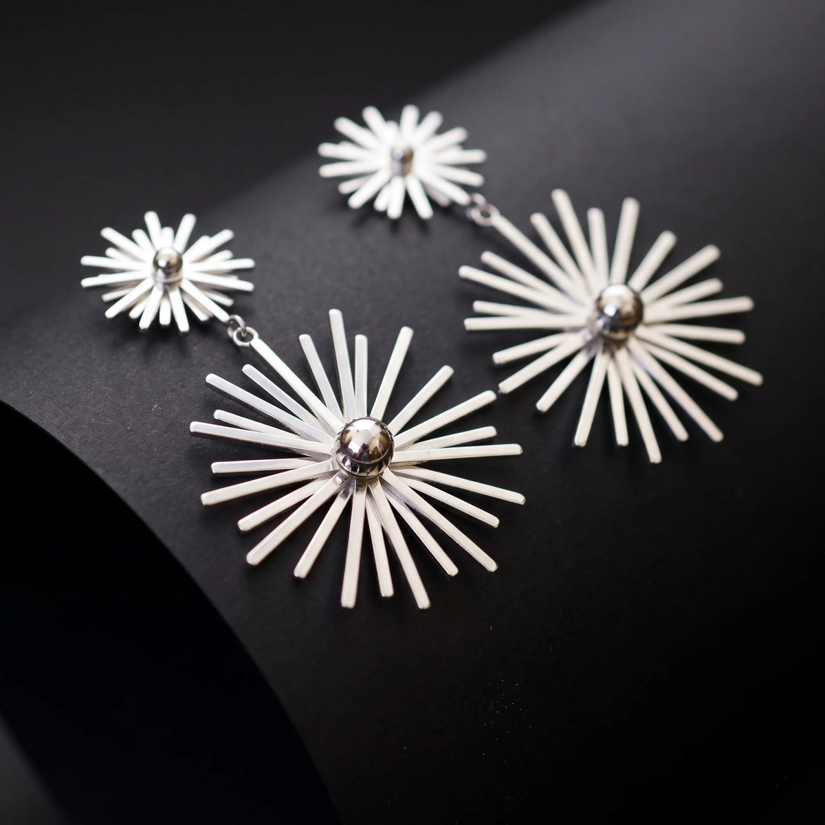 Sunburst statement dangles