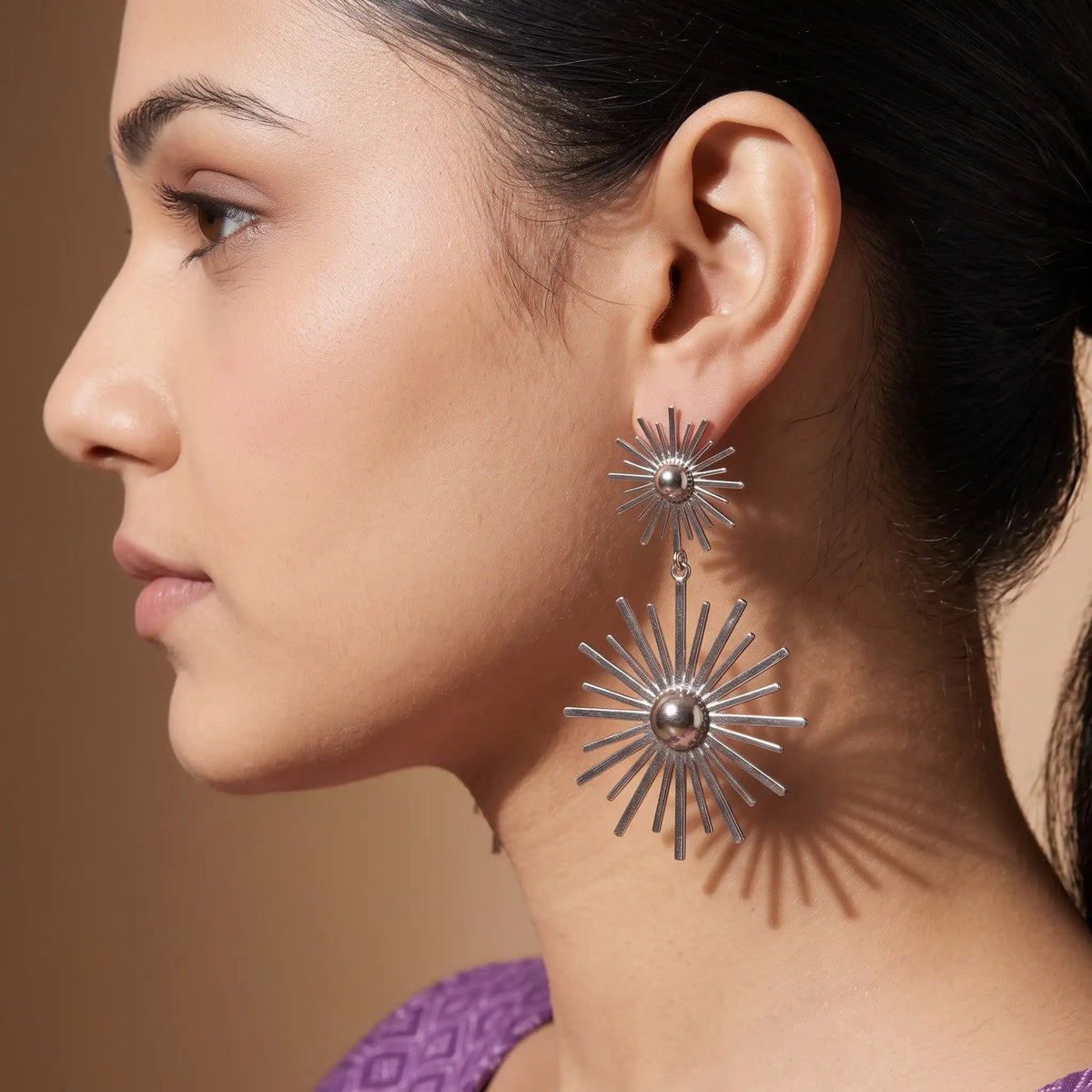 Sunburst statement dangles